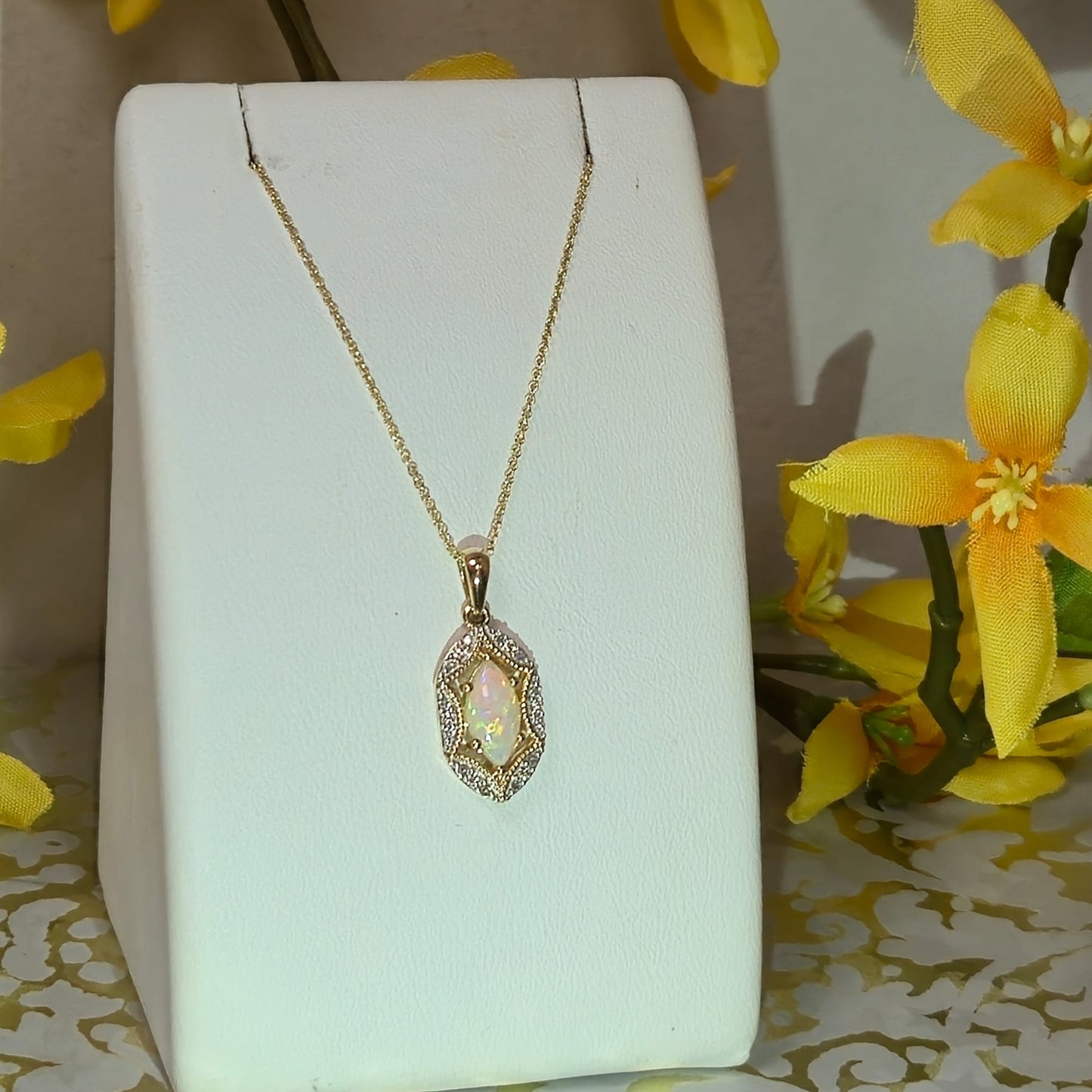 9ct Yellow Gold Opal and Diamond Pendant on 18 inch chain