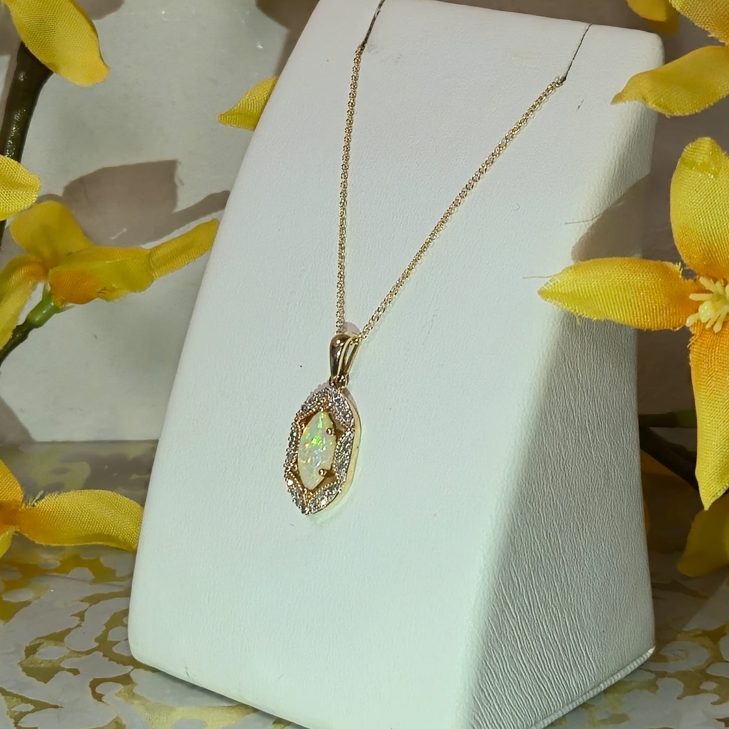 9ct Yellow Gold Opal and Diamond Pendant on 18 inch chain