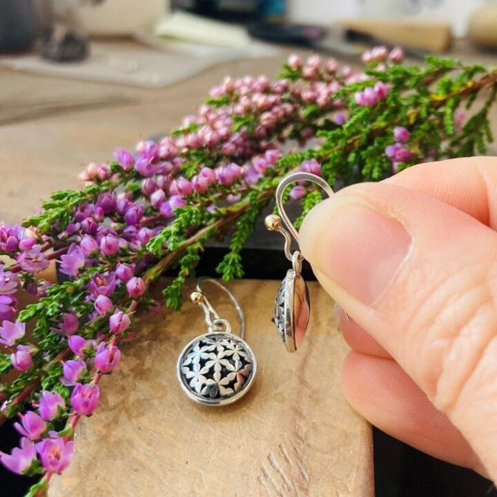 Silver blossom drop earrings