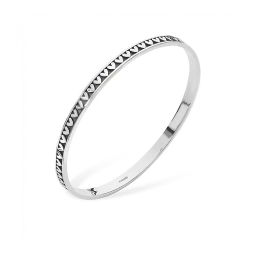 Romantic repeat pattern heart bangle.