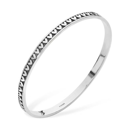 Romantic repeat pattern heart bangle.
