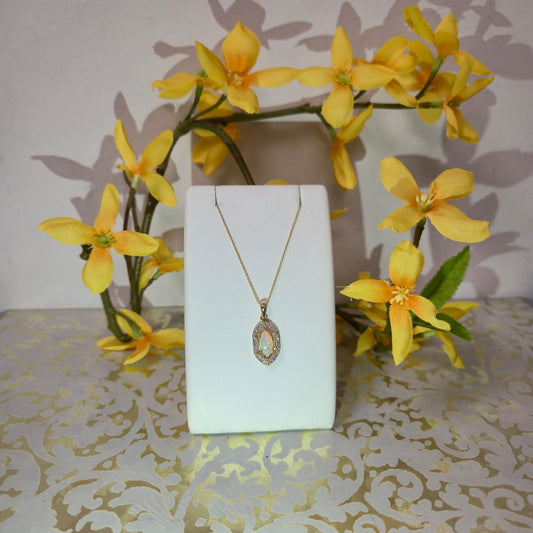 9ct Yellow Gold Opal and Diamond Pendant on 18 inch chain