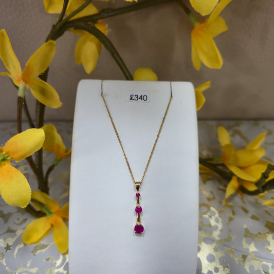 9ct Yellow Gold 3 Stone Ruby Drop Pendant on 18 inch chain